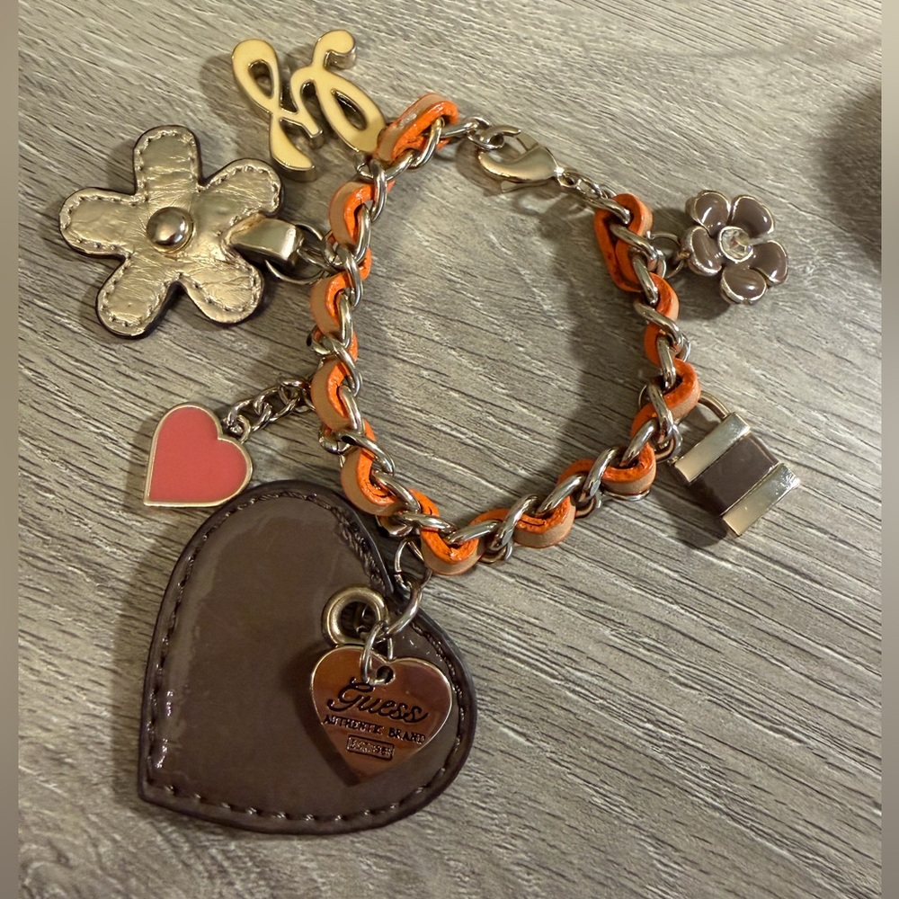 #680 Guess Silver-Toned Charm Bracelet - with Leather Weave Hearts & Flowers